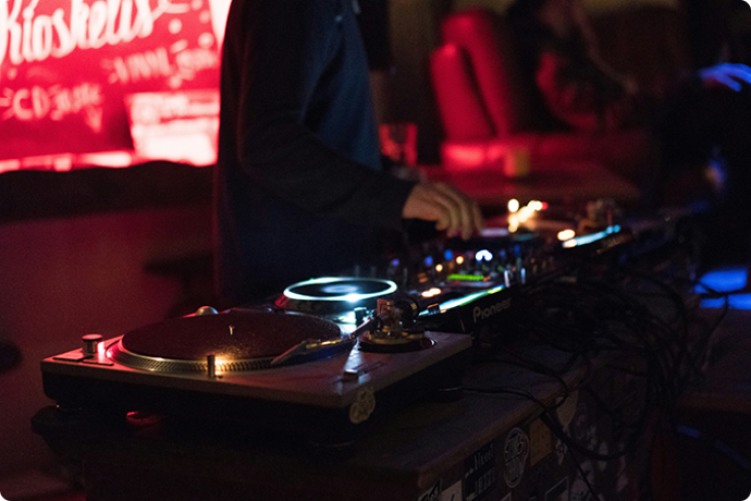 a dj at the decks playing music
