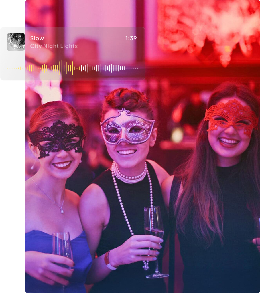 Three people at a masquerade party, wearing elegant masks and holding champagne glasses. The background is softly lit in pink and purple hues.
